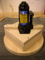 apple cider press -- bottle jack ontop of press board assembly