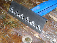 Block of trundle anchor brackets drilled and countersunk