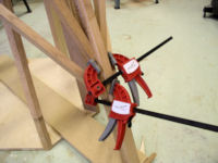 Short braces kept in place with clamps