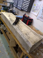 Rough basswood block hand planed to fit in planer
