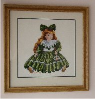 Doll in green dress